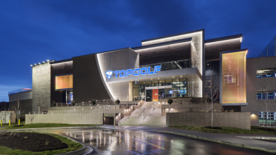 Topgolf Detroit Auburn Hills exterior at night.