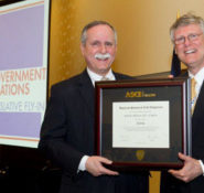Rep. David McKinley of West Virginia, a civil engineer and Society member, is honored for achieving Fellow status by 2013 President-elect Randall Over
