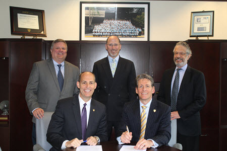 ASCE and Smart City Works have signed a memorandum of understanding. Pictured, front row from left, ASCE Executive Director Tom Smith and Smart City Works founder Greg Satuer; back row, ASCE Senior Managing Director John Durrant, and Smart City Works founders David Heyman and Robert Mazer.