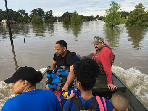 Joey Coco takes Baton Rouge residents from their homes by boat to the nearest safe shelter. PHOTO: Joey Coco