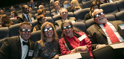 ASCE's 2017 President-Elect Kristina Swallow and Past-President Mark Woodson settle into their theater seats with their respective spouses, David and Lupe, donning Dream Big 3D glasses. Courtesy Jason Dixson Photgraphy