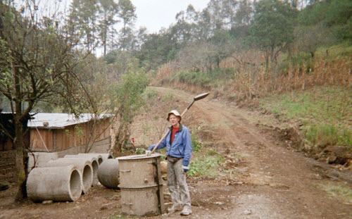 photo of man holding shovel