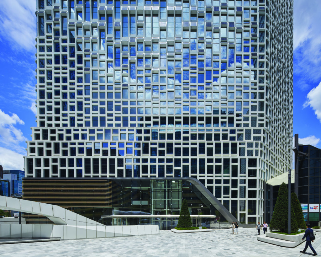 Modular facade of renewable tech firm’s HQ features photovoltaic panels ...