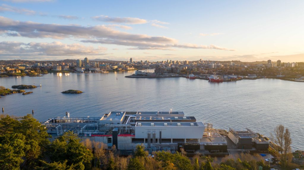 aerial shot of a harbor with a wastewater treatment plant in the foreground